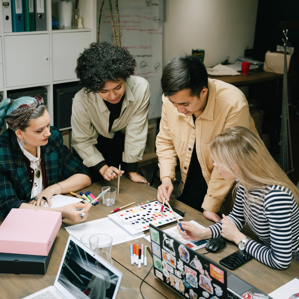 marketing team working together on a project.