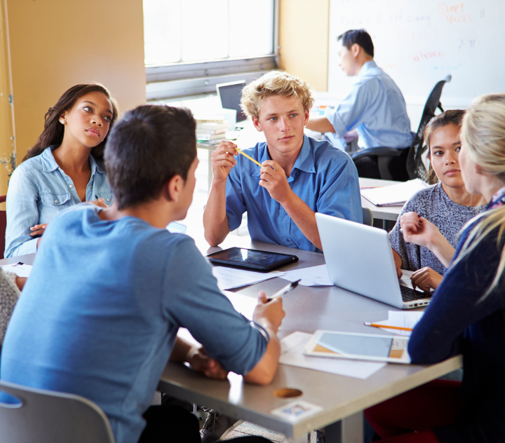 A group of people collaborating and discussing