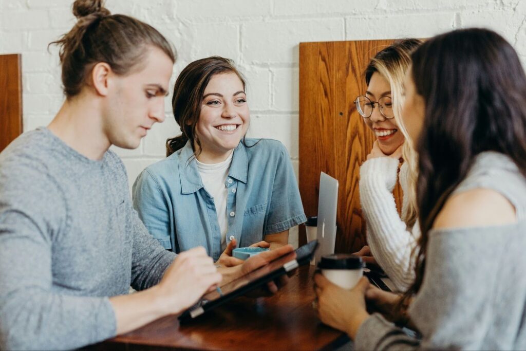Four People Meeting at a Coffee Shop