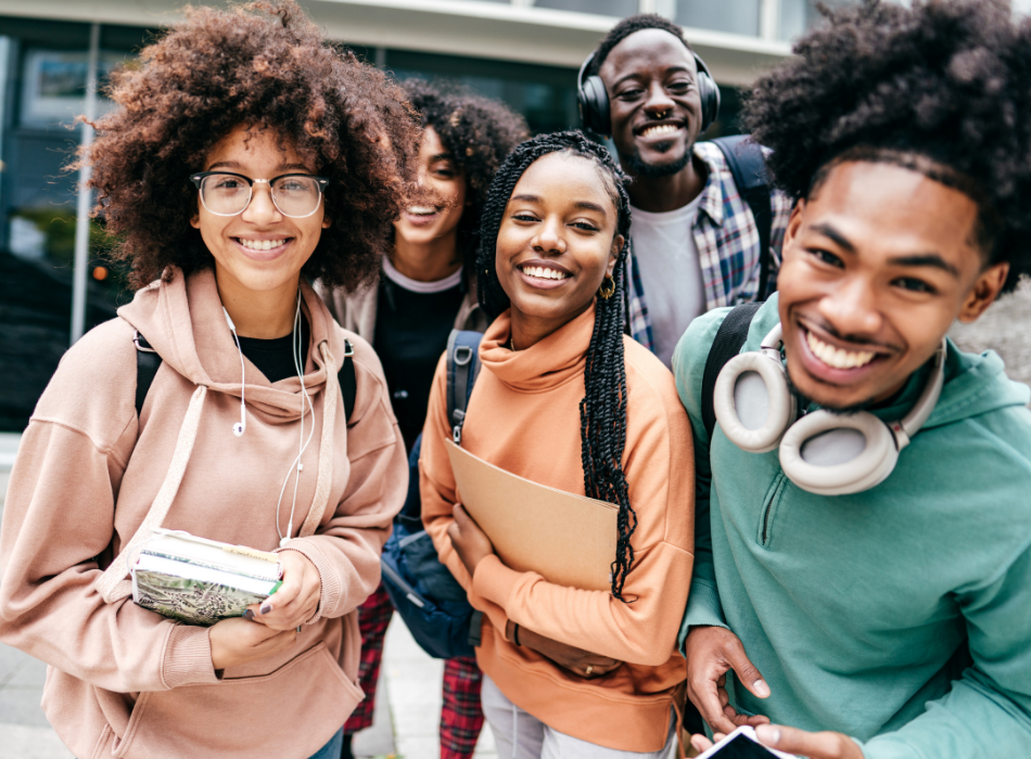 A Group of Teens Looking at the Camera and Smiling 