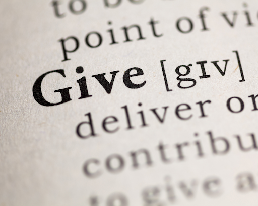 A page in a dictionary showing the word give