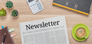 Newsletter Paper on Desk