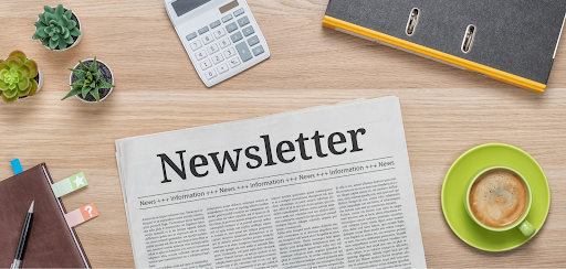 Newsletter Paper on Desk