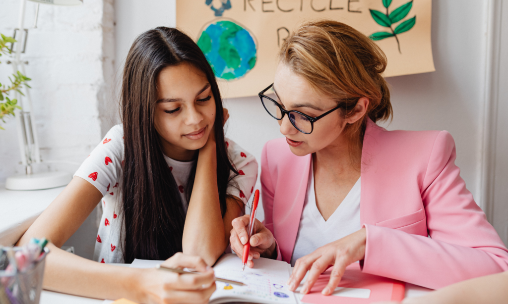 An alumni mentoring a current student of a K12 school
