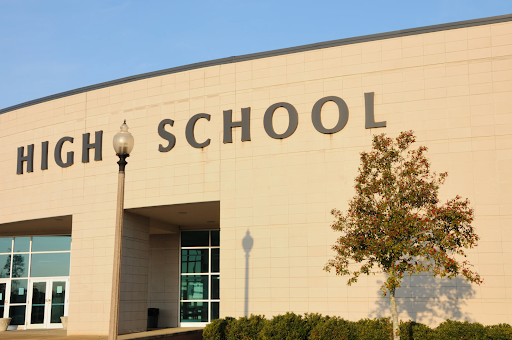 High school campus in the fall representing the peak alumni giving season in September to December.