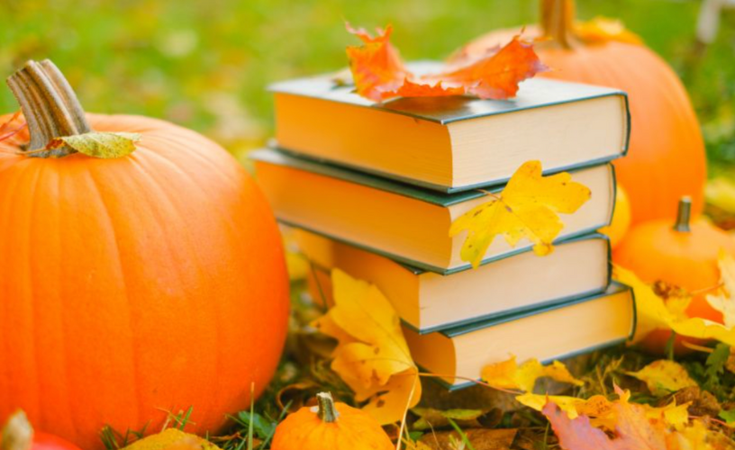 Fall education season with books and autumn leaves representing alumni giving gratitude