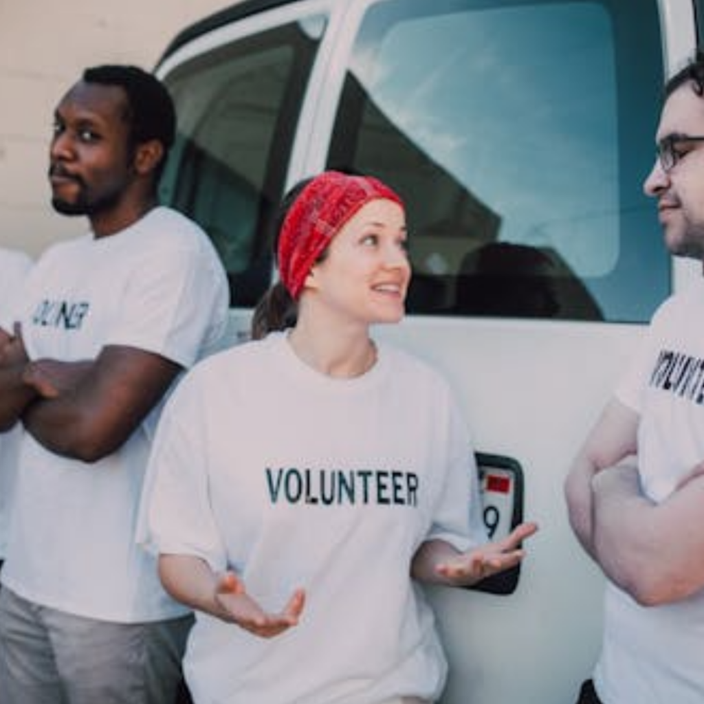  [Alt text: Public high school gathering for Giving Tuesday campaign with alumni and community supporters]