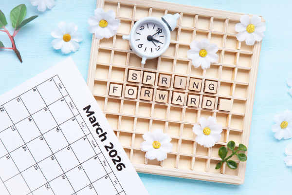 March calendar with spring forward reminder representing planning for spring alumni engagement